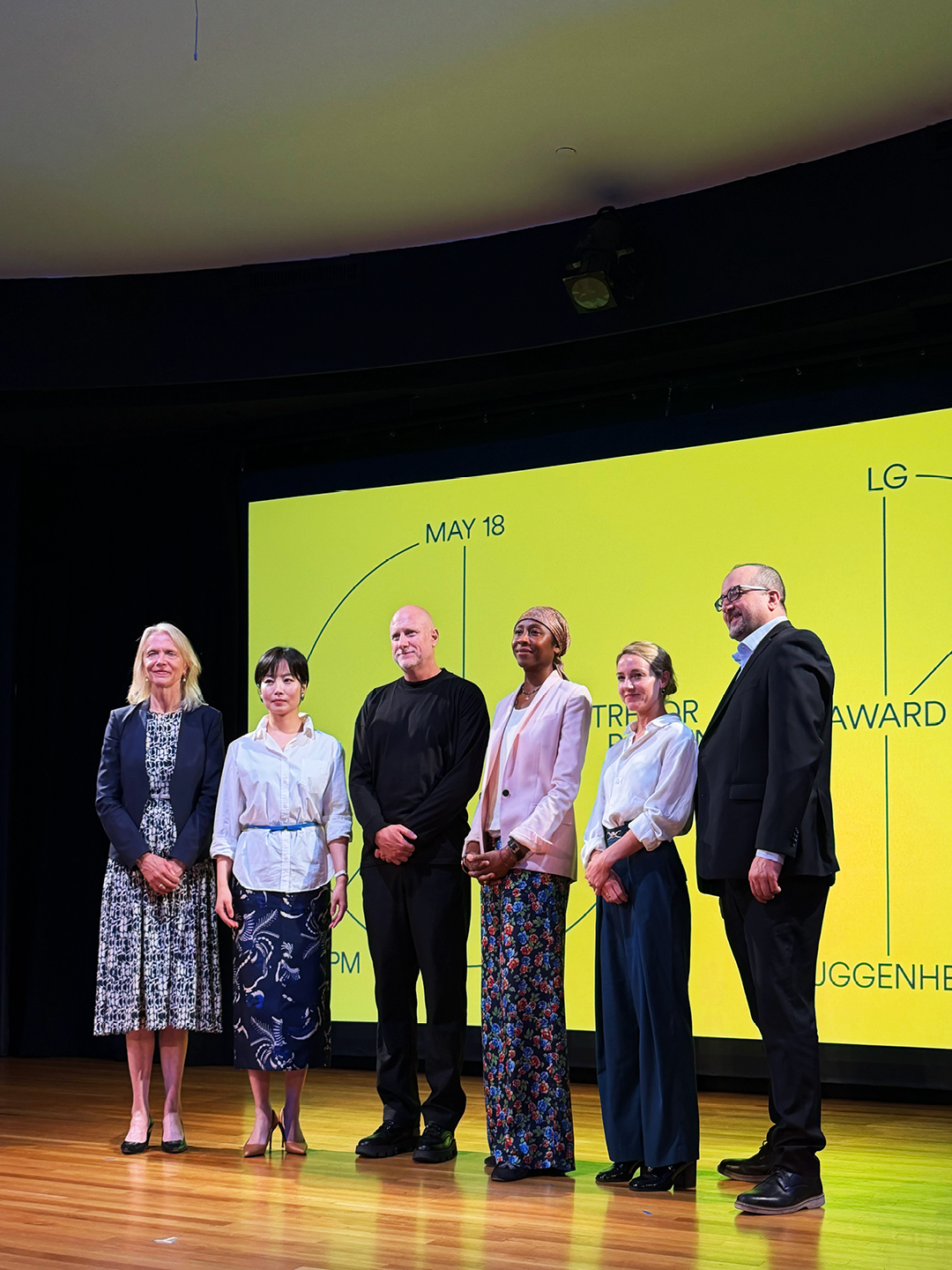 Commemorative photo of LG, Guggenheim, and Trevor Paglen representatives after the public program