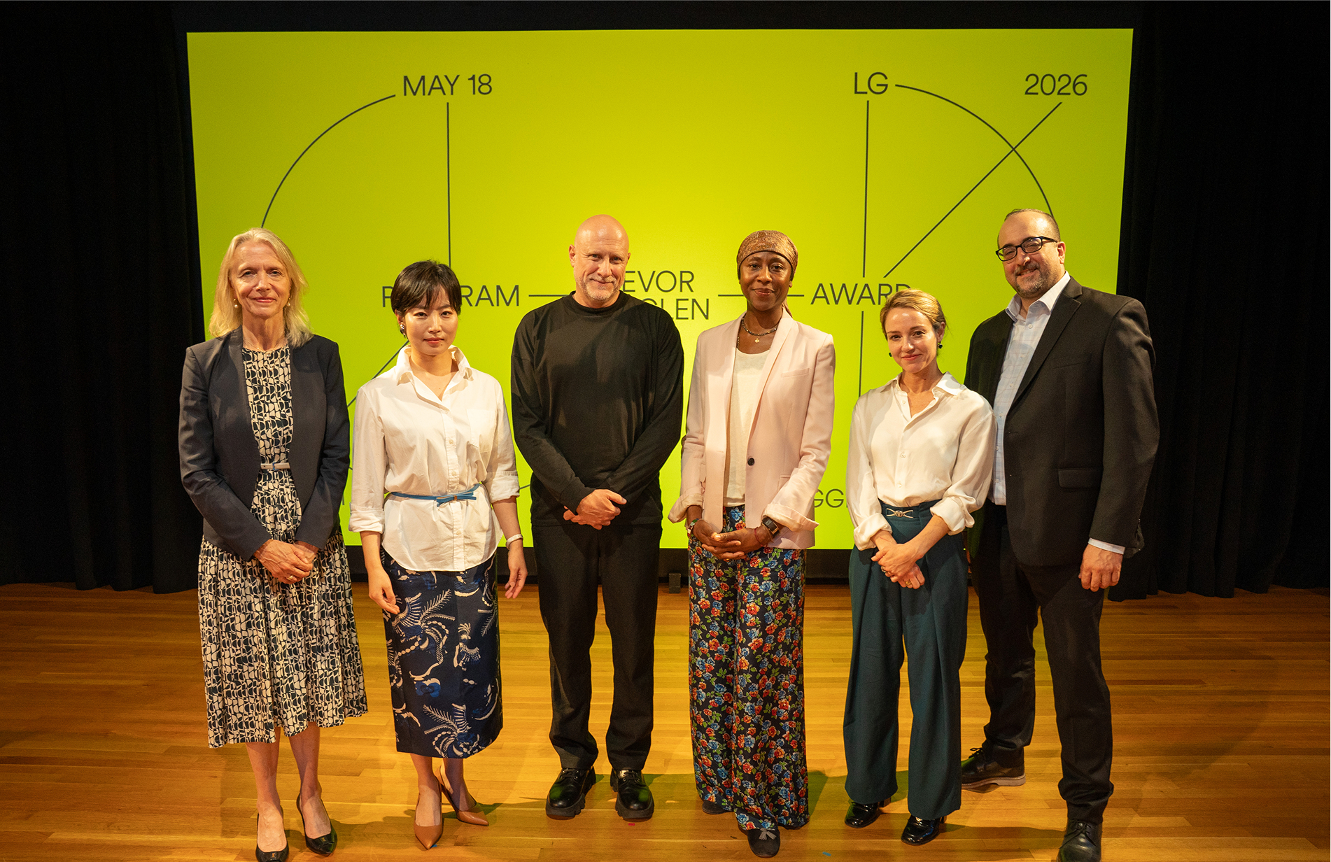LG, Guggenheim, and Trevor Paglen representatives posing for a commemorative photo after the public program